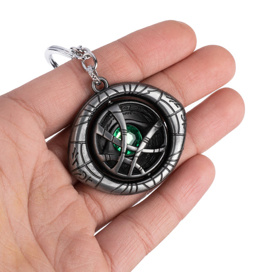 Basket Bum's Mystical Marvel: Metal Eye of Agamotto Rotating Keychain in Silver Splendor